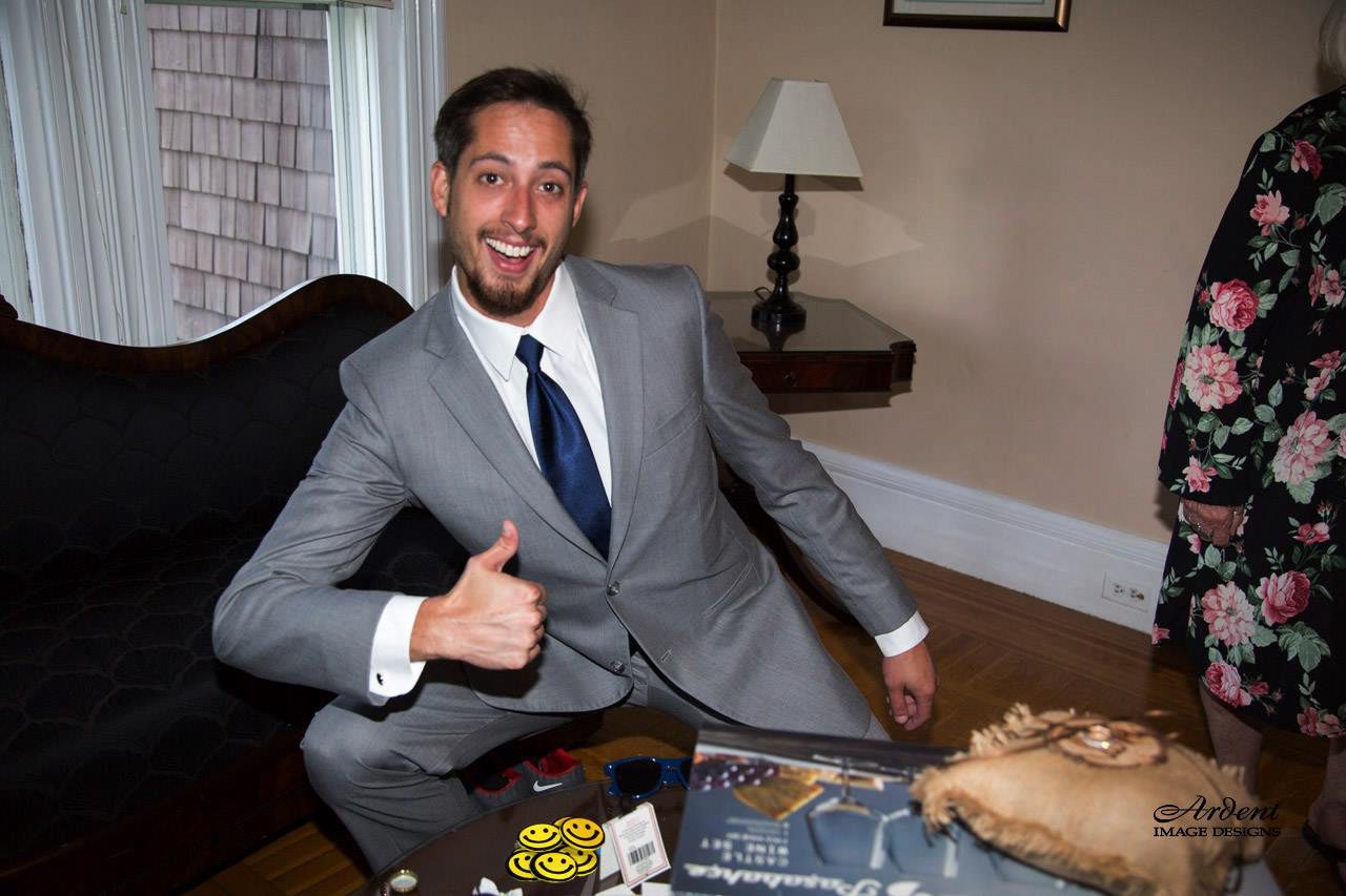 Kat & Jesse, A Gazebo Ceremony groomsman giving thumbs up on grooms room