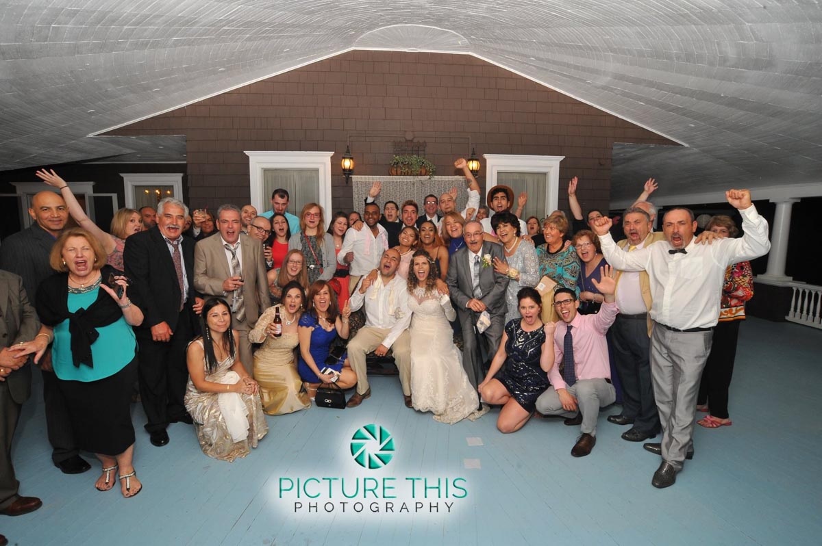 A Victorian Era Reception a-victorian-era-wedding-reception-group-photo-on-veranda