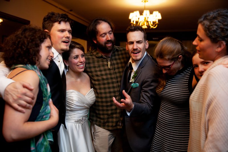 Reception Fun cuban-flair-wedding-bride-and-groom-with-friends-singing